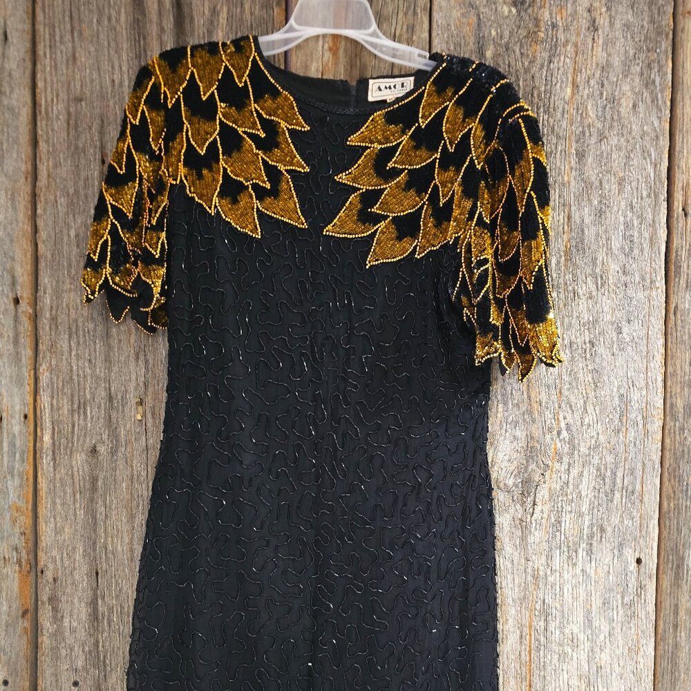 AMOR BLACK DRESS WITH GOLD AND BLACK EMBELLISHMENTS SIZE MEDIUM